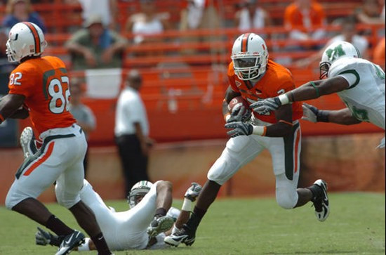 University of Miami running back Graig Cooper #2 led the Hurricanes by rushing 12 times for 116 yards and returned 3 punts for 28 yards in a game...