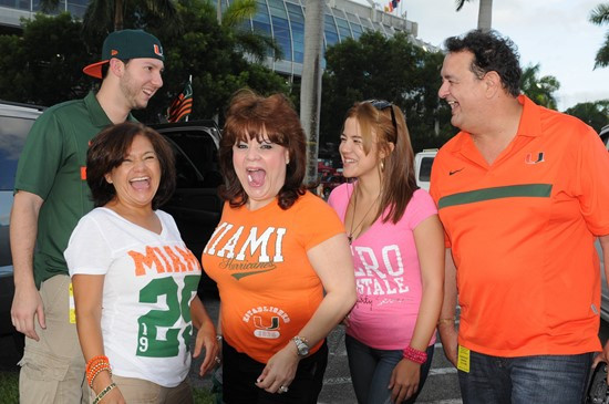 University of Miami Hurricane fans show their team spirit in a game against the Savannah State Tigers at Sun Life Stadium on September 21, 2013. ...