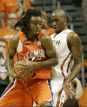 Clemson center Raymond Sykes drives up against Anthony King during the first half. (AP Photo/Wilfredo Lee)