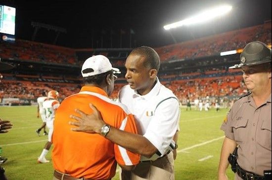 University of Miami Hurricanes head coach Randy Shannon and Florida A&M coach Joe Taylor shake hands at the end of the game at Land Shark Stadium on...