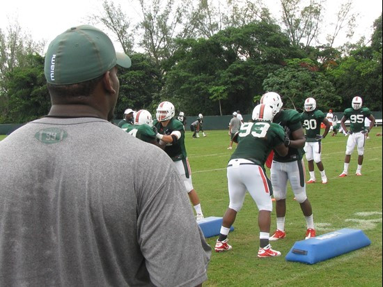 Marcus Forston directs his defensive line teammates during a practice drill on day six of Fall training camp.