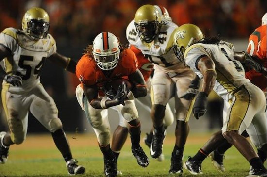 University of Miami Hurricanes running back Graig Cooper #2 carries the ball in a game against the Georgia Tech Yellow Jackets at Land Shark Stadium...