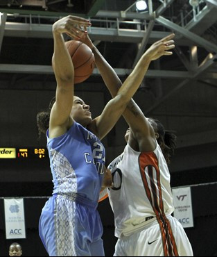 Maria Brown blocks a shot by North Carolina's Krista Gross. (AP Photo/Alan Diaz)